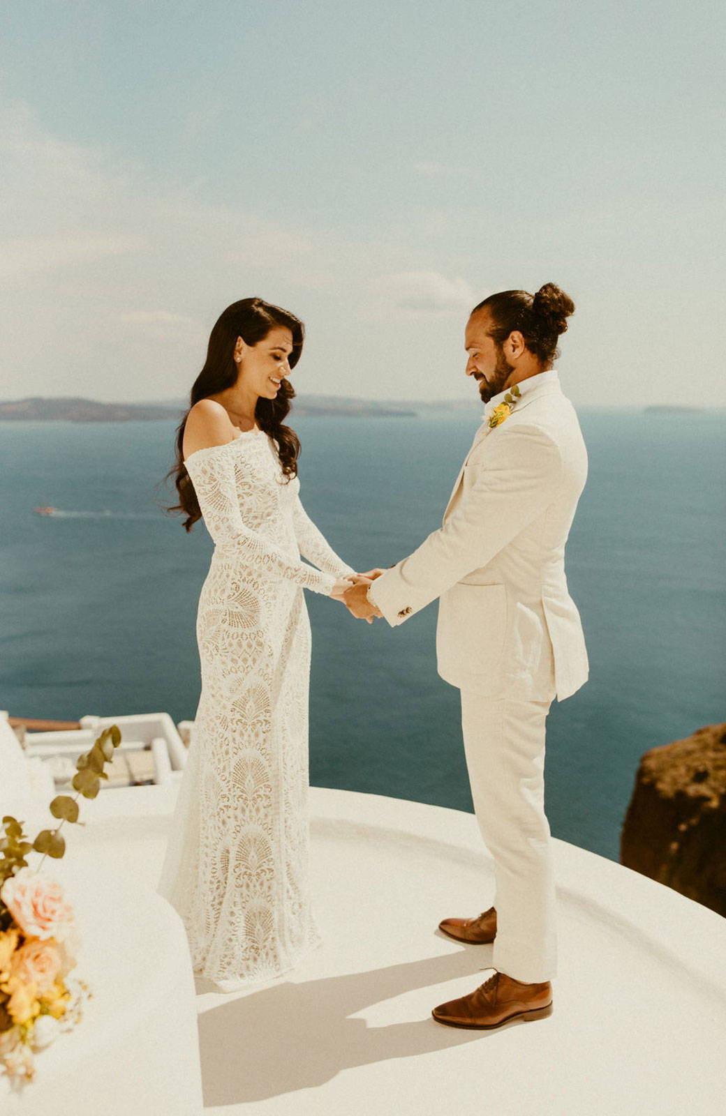 Bride and Groom holding hands