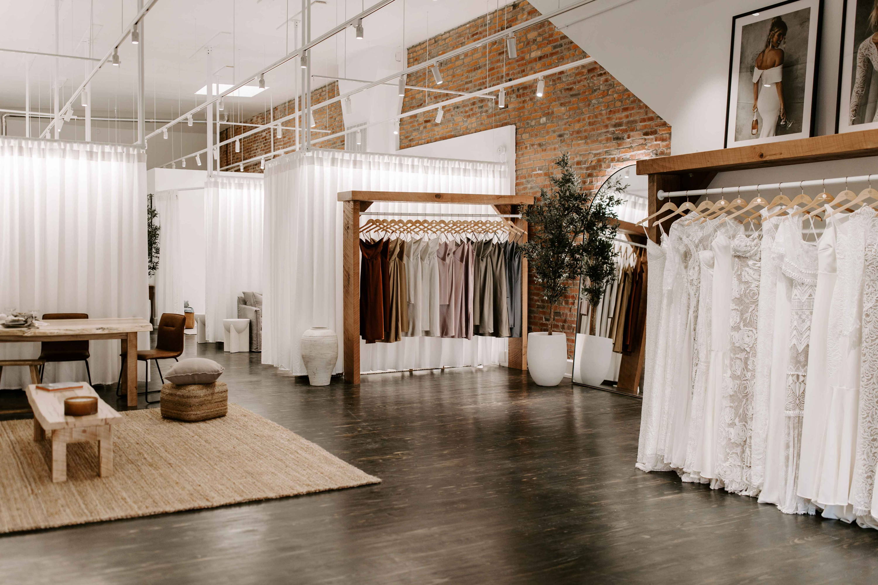Showroom with bridesmaids and wedding dresses
