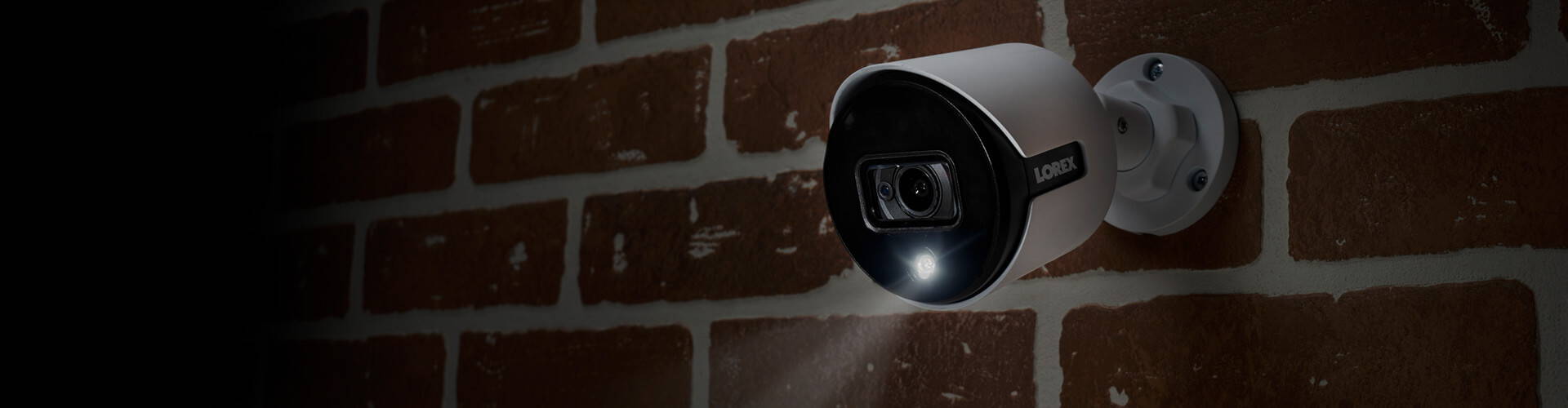 active deterrence security camera on brick wall banner