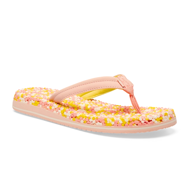 Pink flip-flop with floral pattern on the sole.