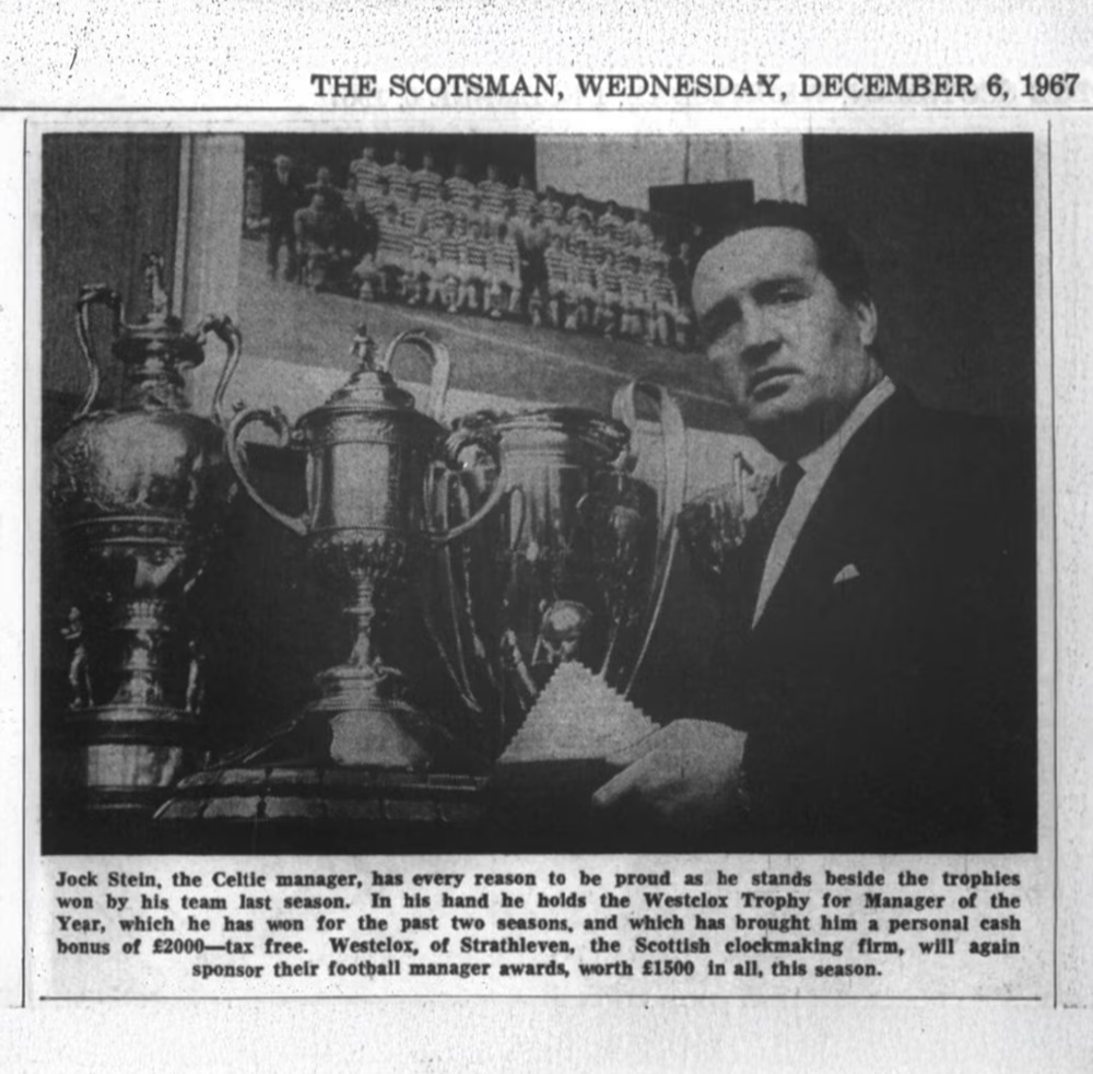 Jock Stein holding the Westclox Football Manager of the Year trophy