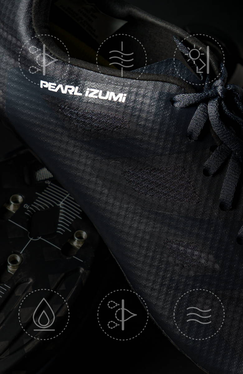 Close up shot of black PEARL iZUMi road cycling shoes with technology iconography overlays highlighting various technologies.