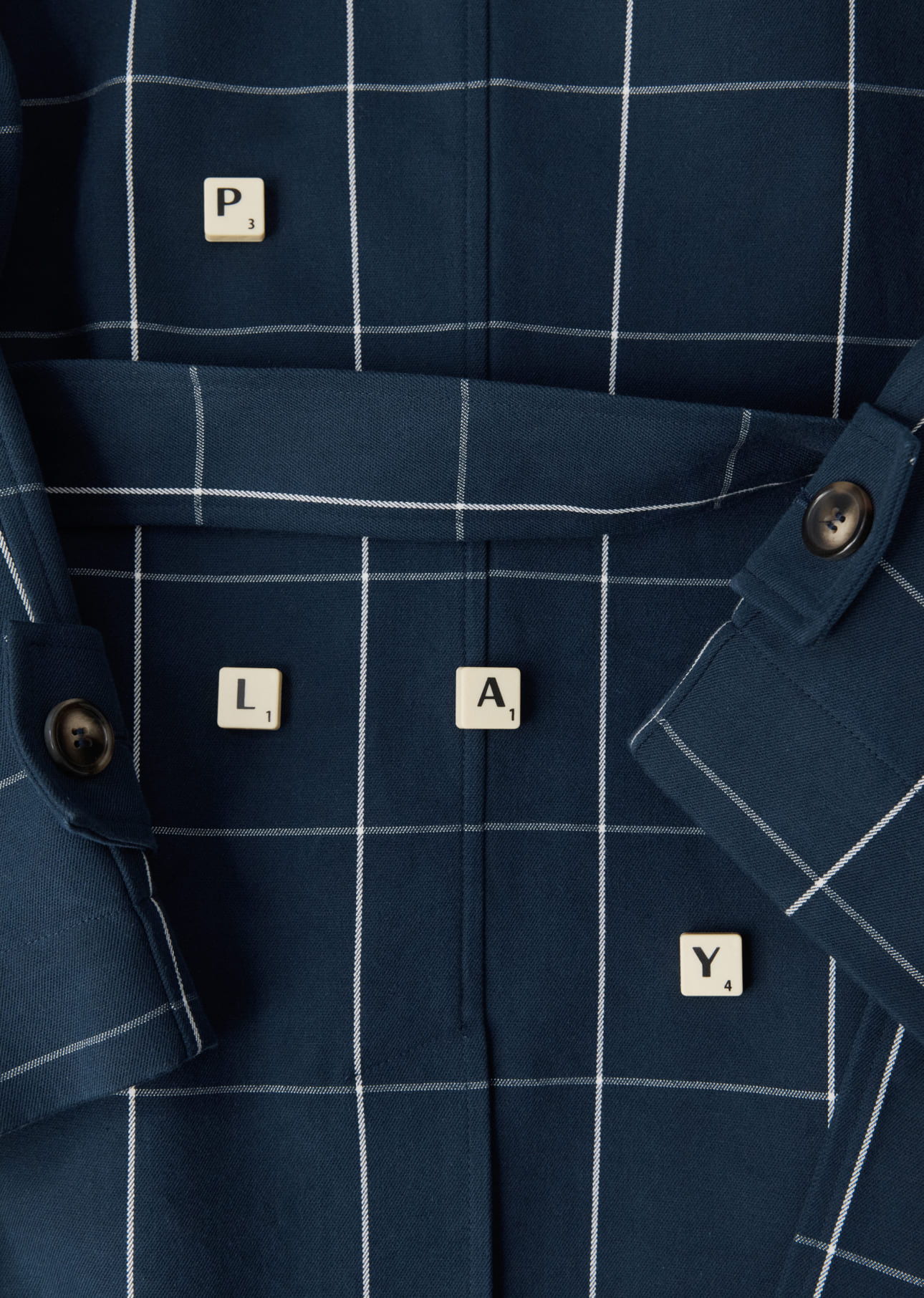 A close-up of a navy shirt with 