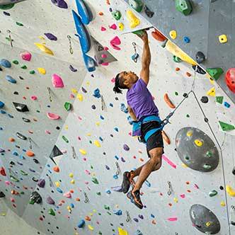 Climber in rock gym