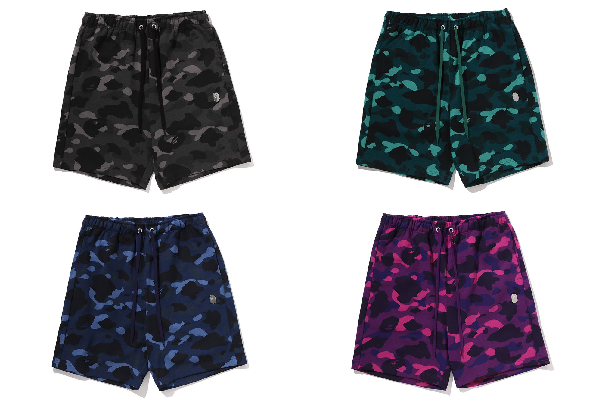 Four pairs of patterned shorts in various colors and designs.