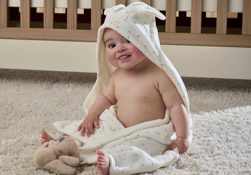 Baby wearing a bath time towel