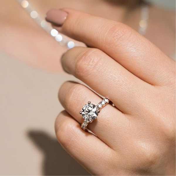 an affordable and absolute dreamy 10 stone diamond accented wedding ring