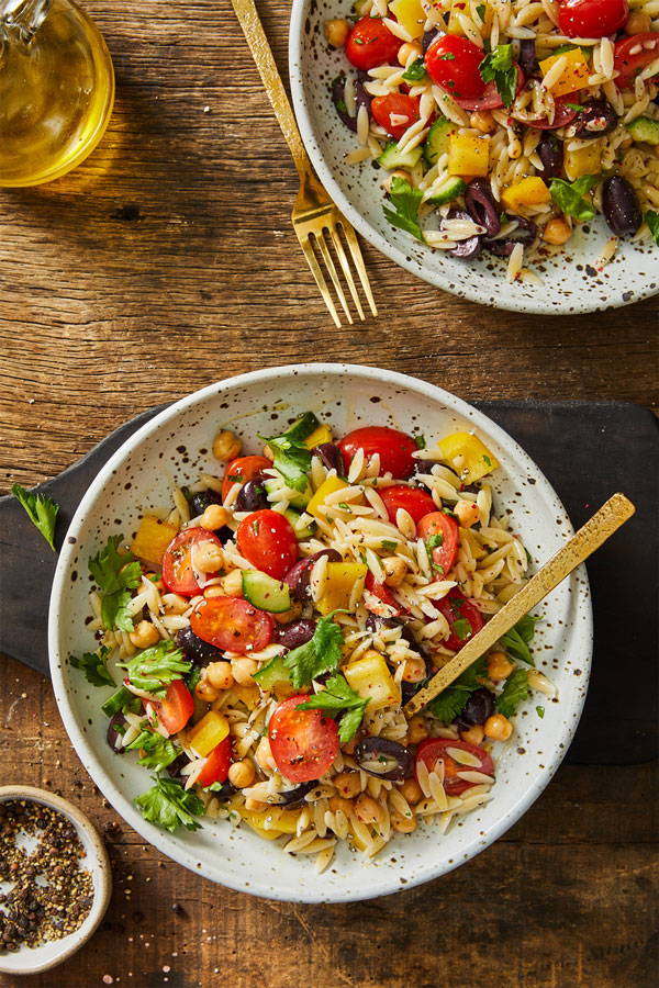 Orzo pasta salad with fresh vegetables