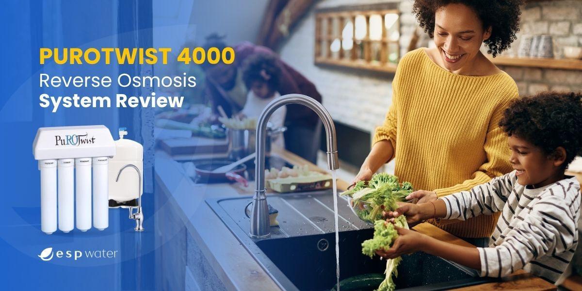Woman and child washing vegetables near a sink with a water filter system.