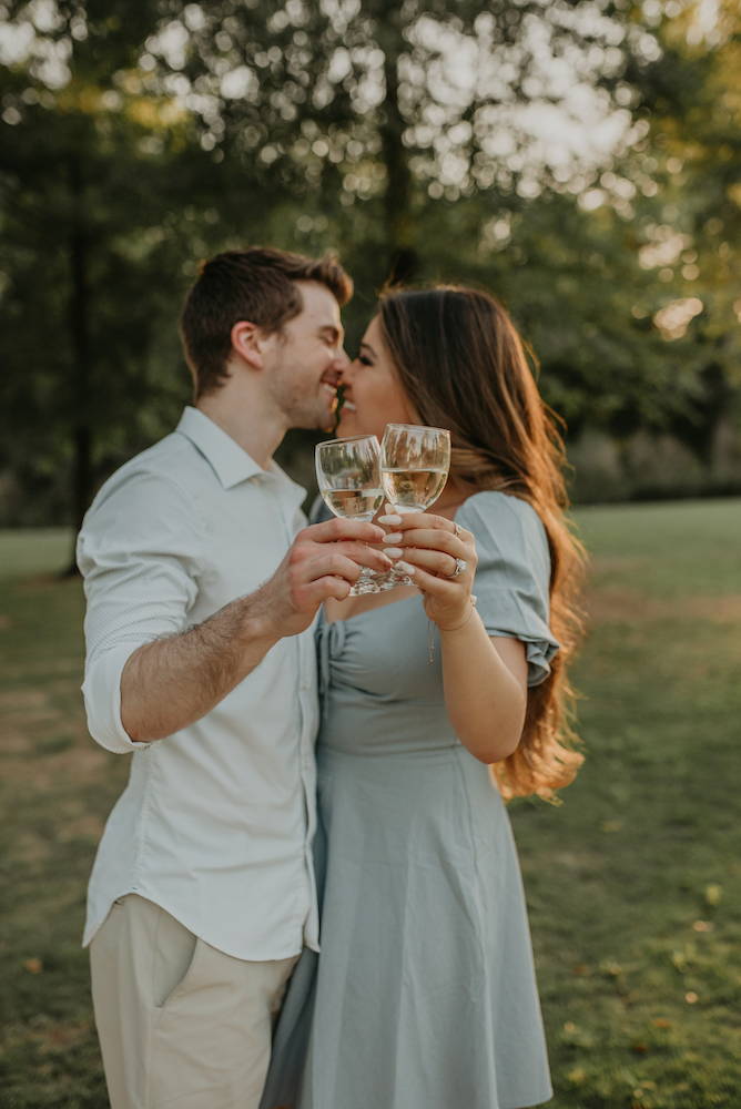 couple toasting over engagement