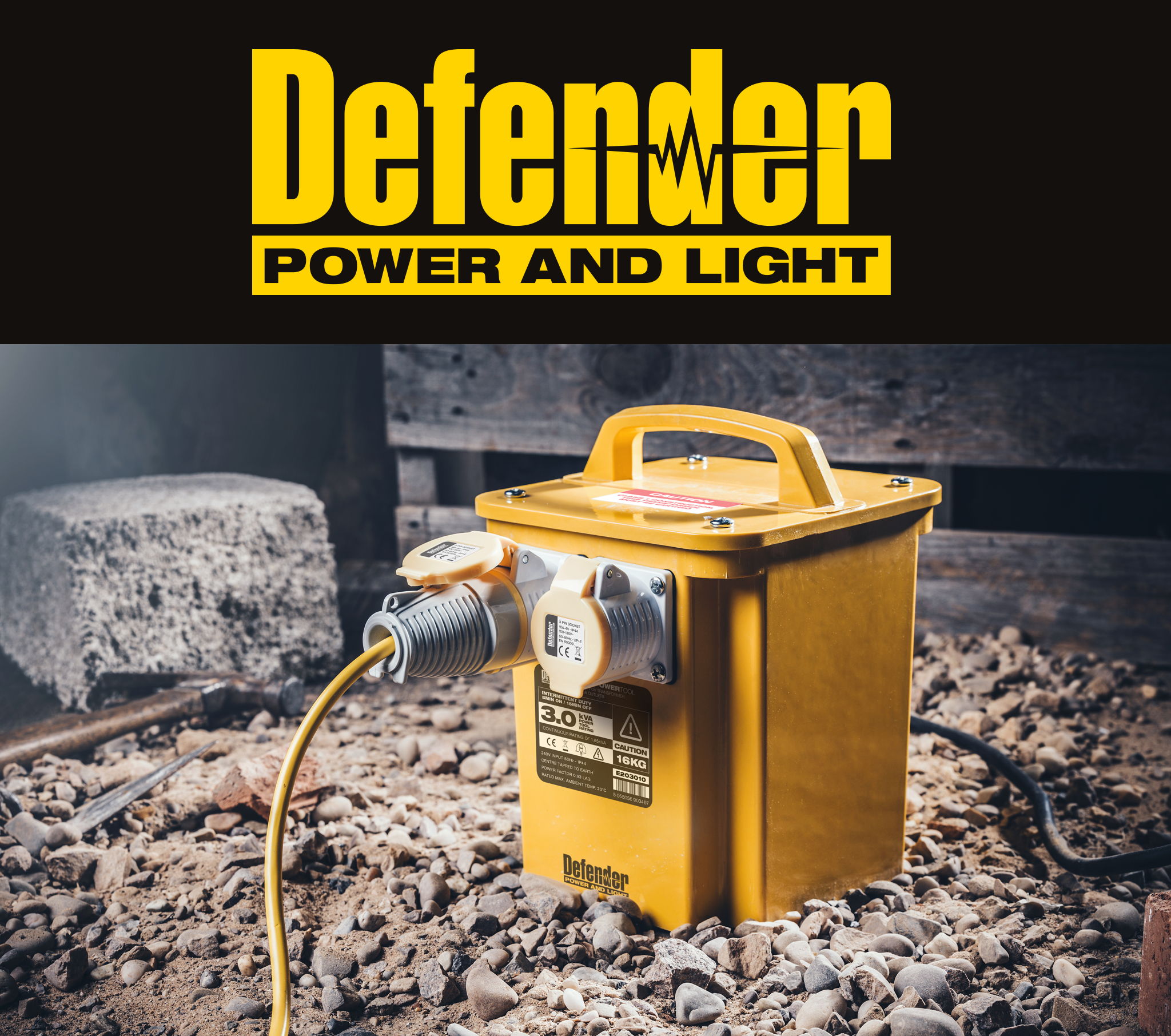 Yellow power box on rocky ground with cable, labeled 