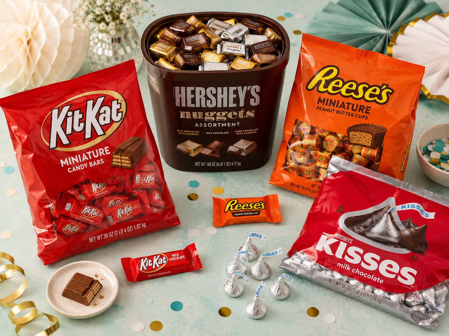 The All-Hands and Company Party Kit bulk candy bundle: Hershey's Nuggets display tub, Kit Kat Miniatures, Reese's Miniature Peanut Butter Cups, and Hershey's Kisses &mdash; premium all-chocolate variety for a company event table