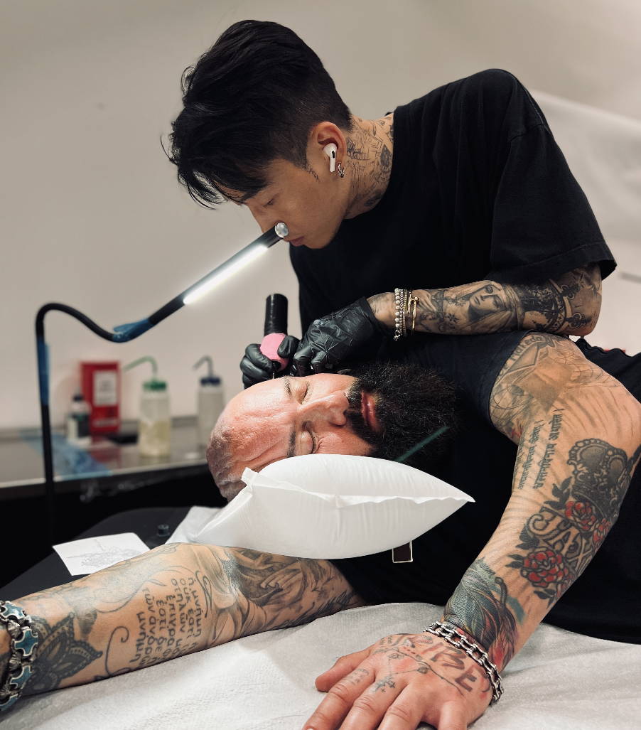 Mr K Head Tattoo on Drew Plotkin