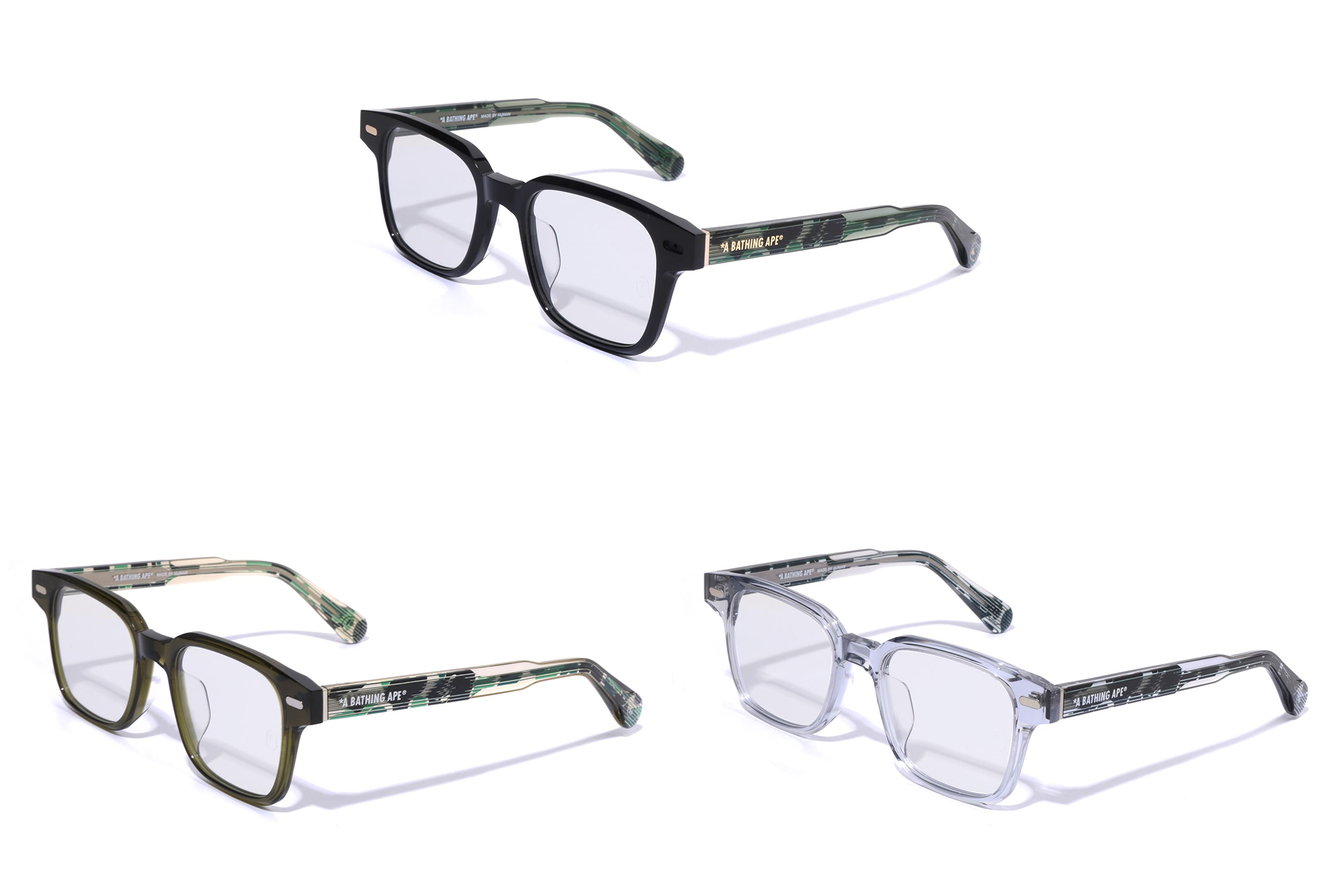 Three pairs of eyeglasses displayed on a white background.