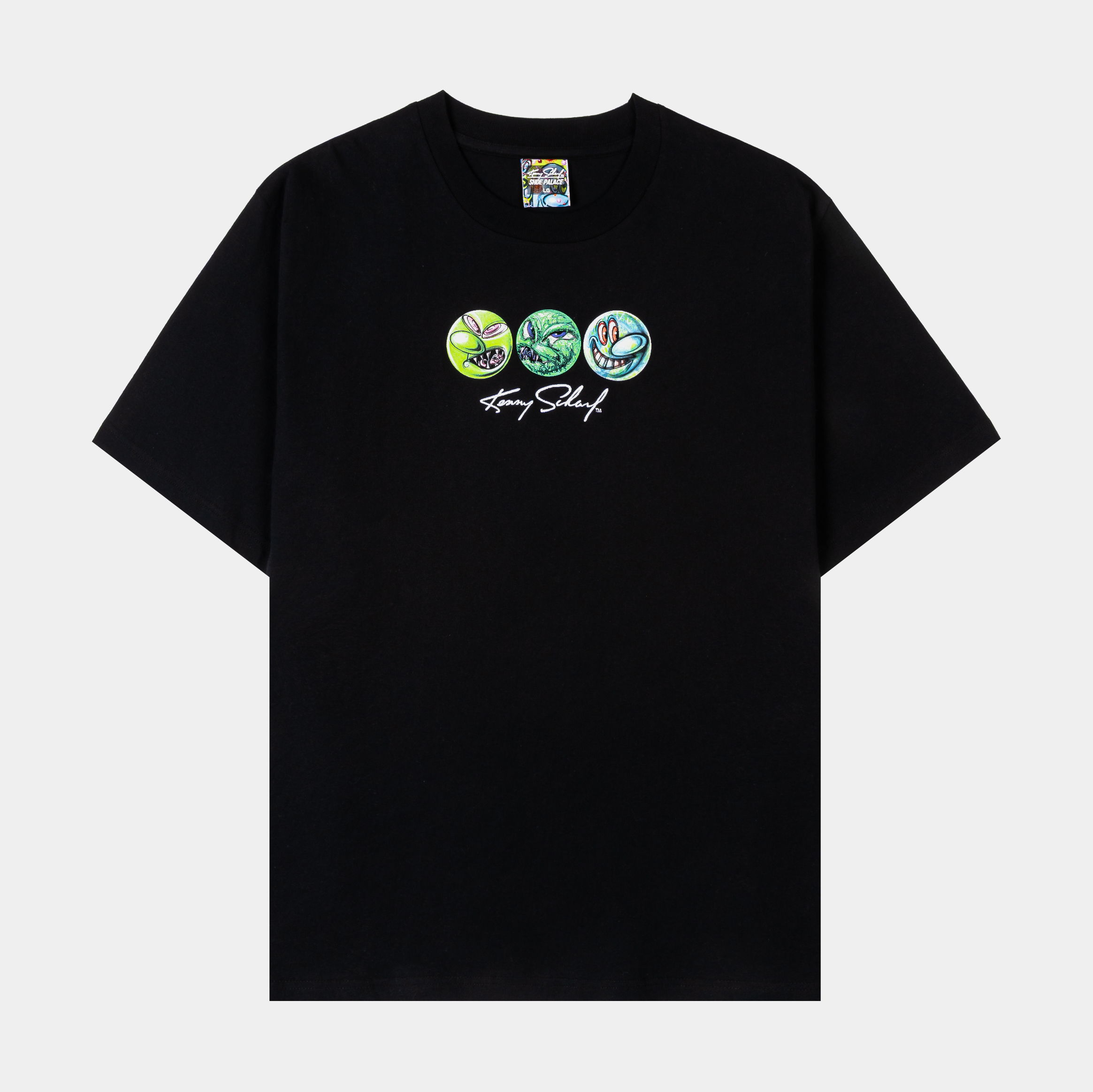 Black t-shirt featuring three circular designs and text below.
