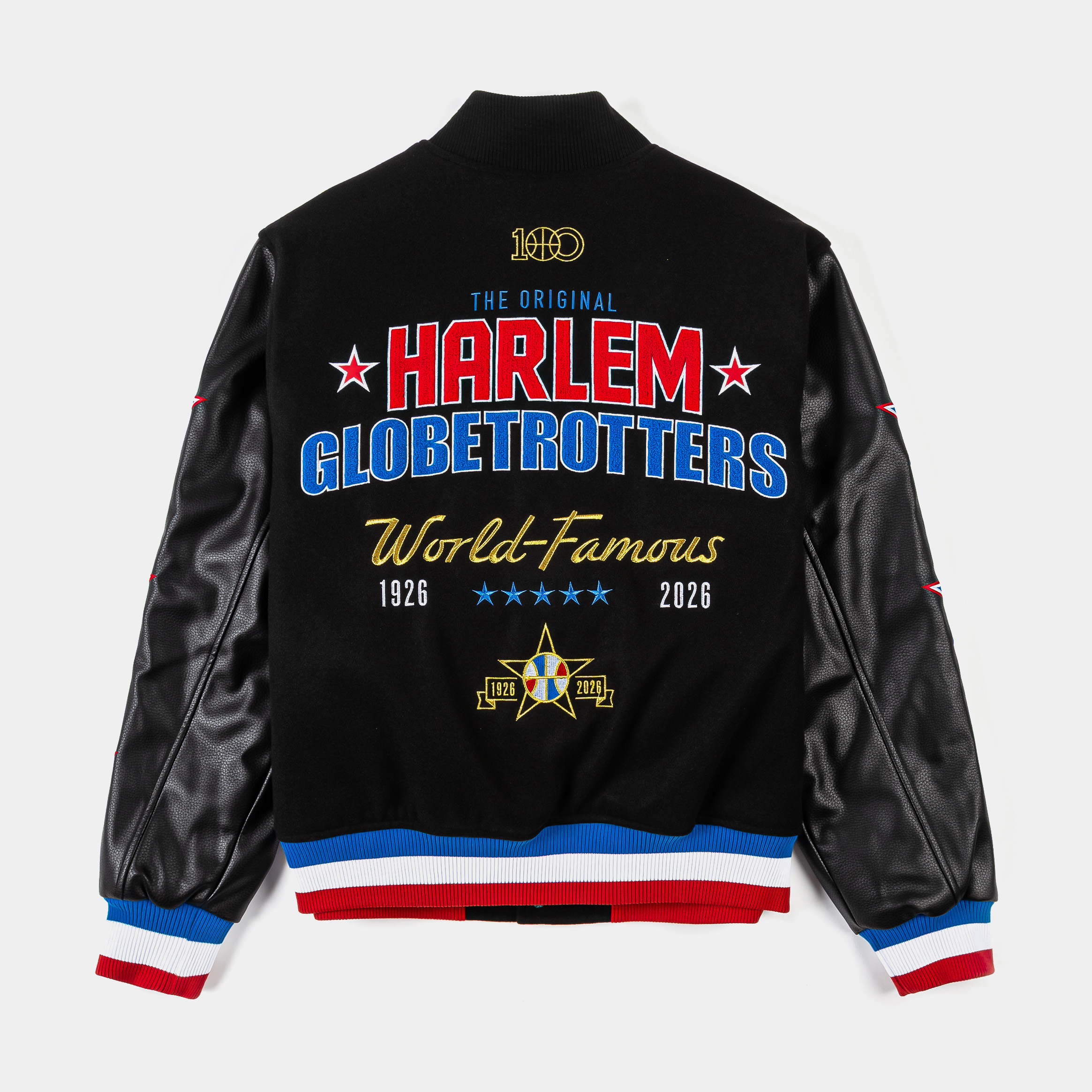 Black varsity jacket with leather sleeves and star designs.