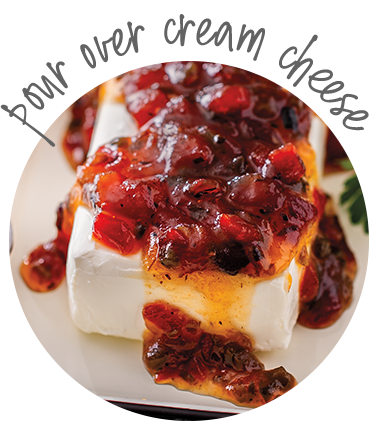 View Bacon Pepper Cream Cheese recipe, featuring cream cheese topped with bacon pepper jam.