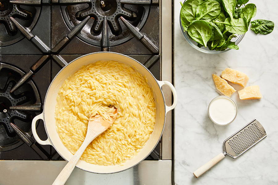 Orzo, stock and wine stirred to combine