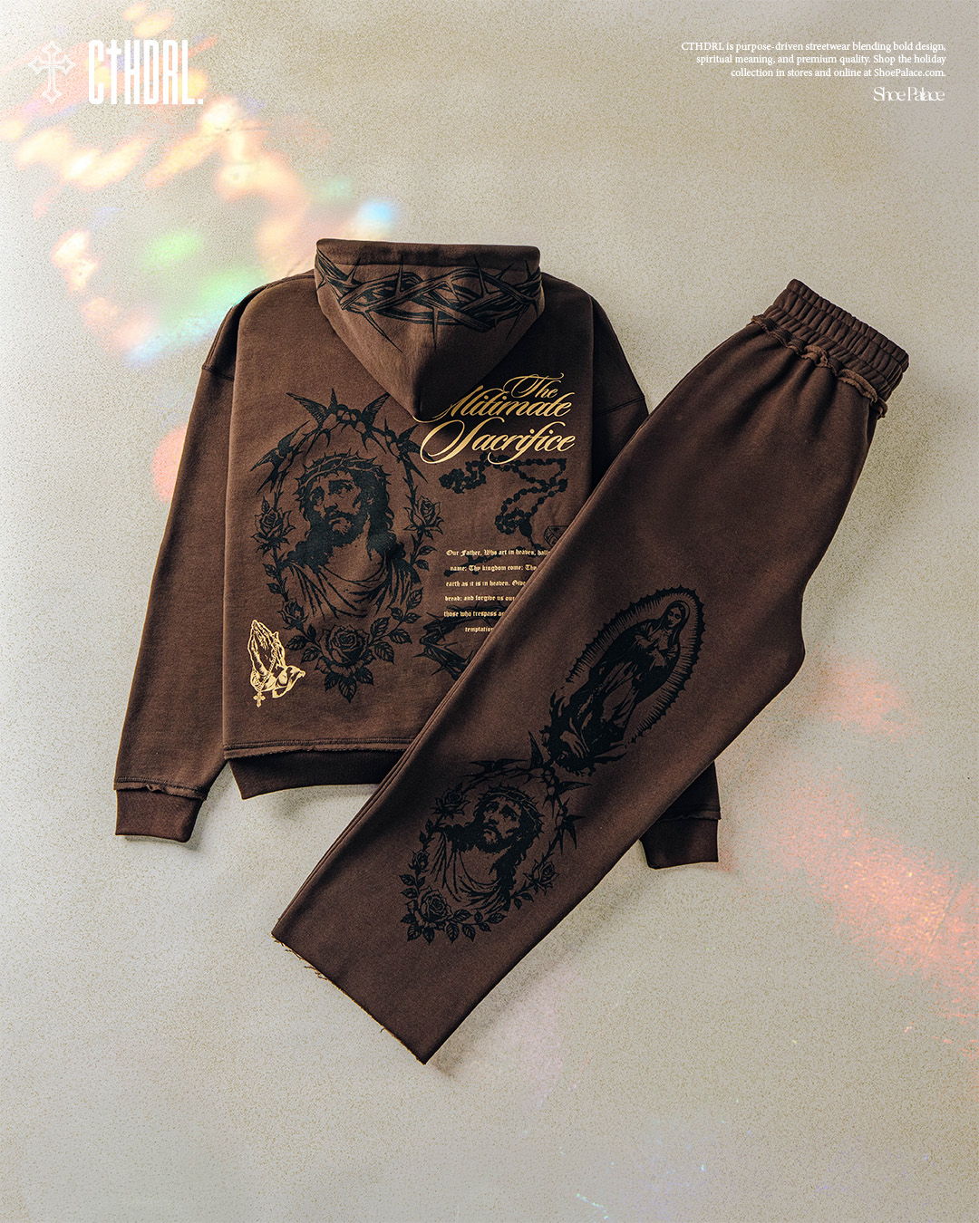 Brown sweat outfit featuring intricate designs and a relaxed fit.