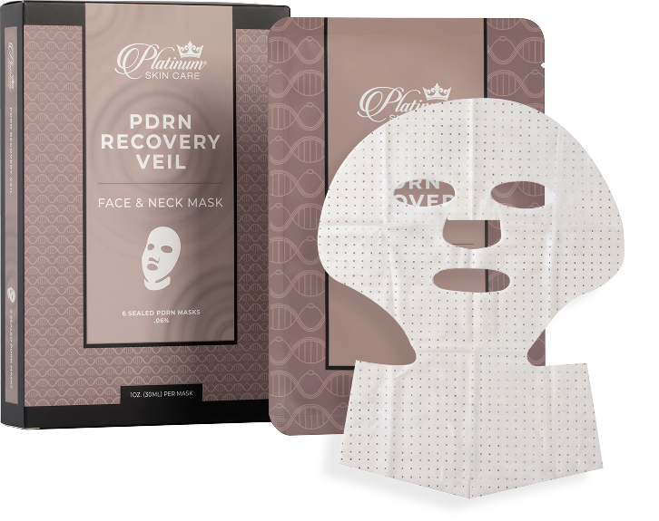 White skincare mask with cutouts for eyes, nose, and mouth.