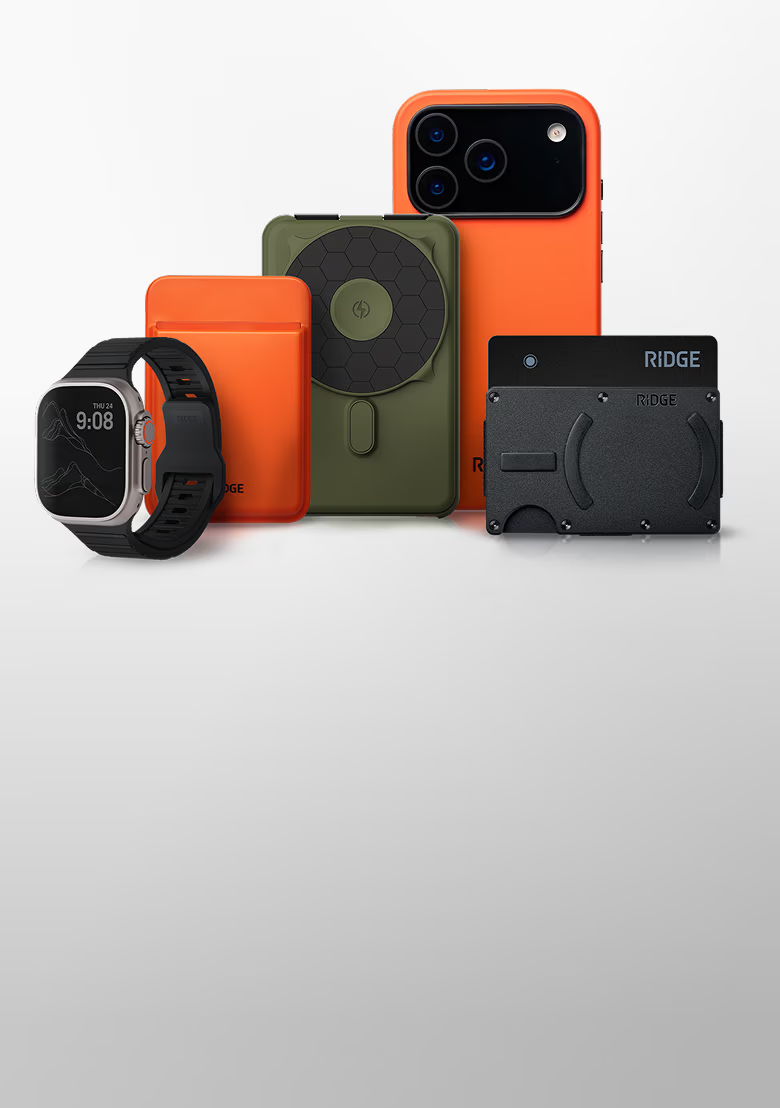 A collection of orange and green tech accessories on a light background.