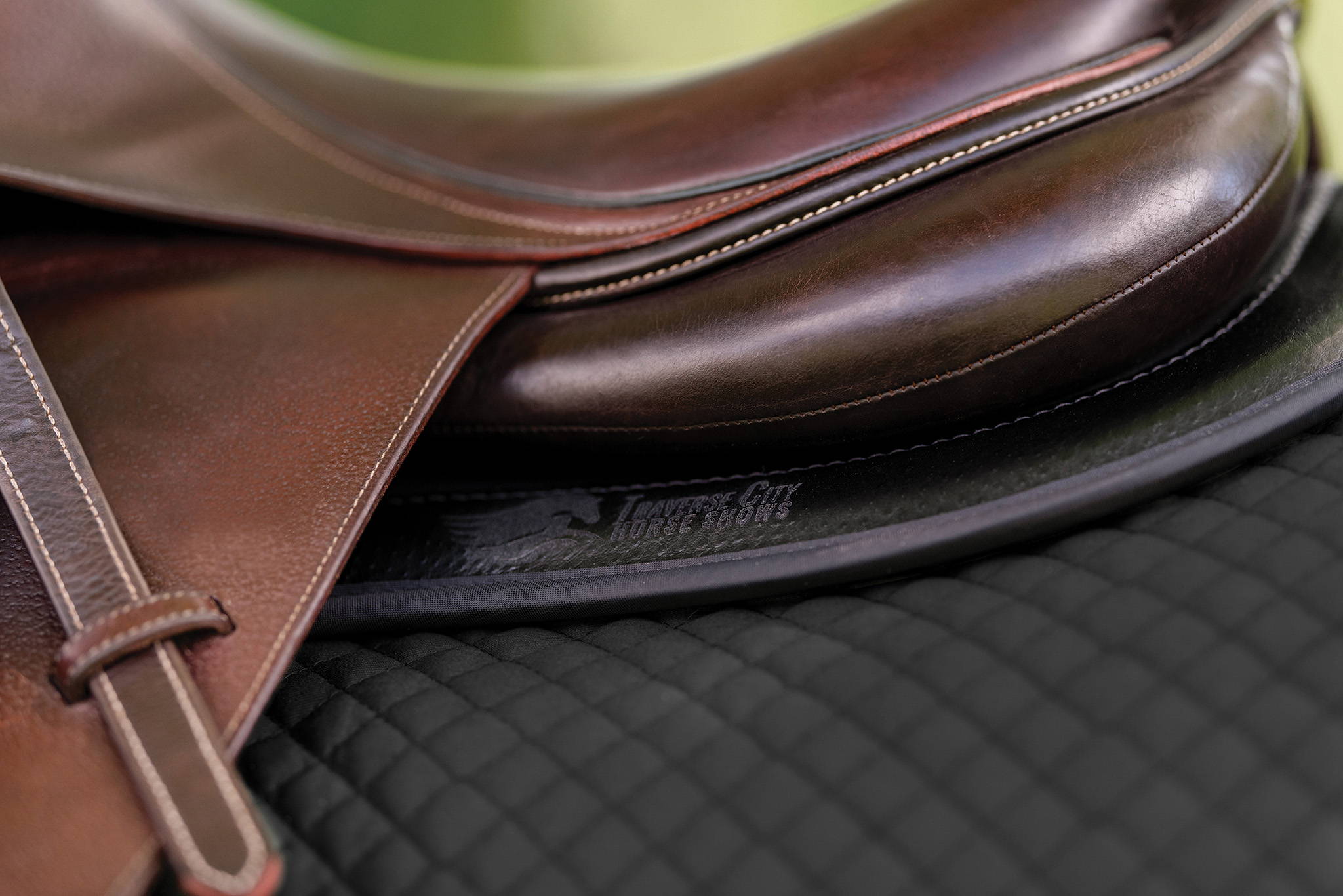 Close up of ImpacTeq Half Pad with Black Ostrich EverLeather Trim and etching