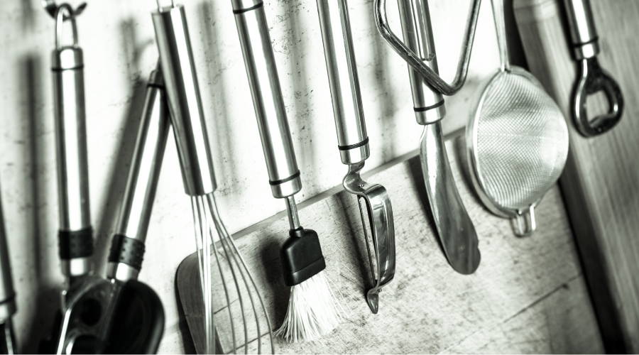 stainless steel kitchen tools hanging