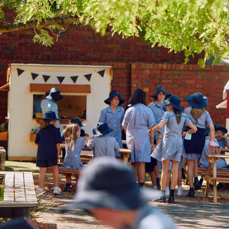 Students at St finbarr's Primary School's cubby house village