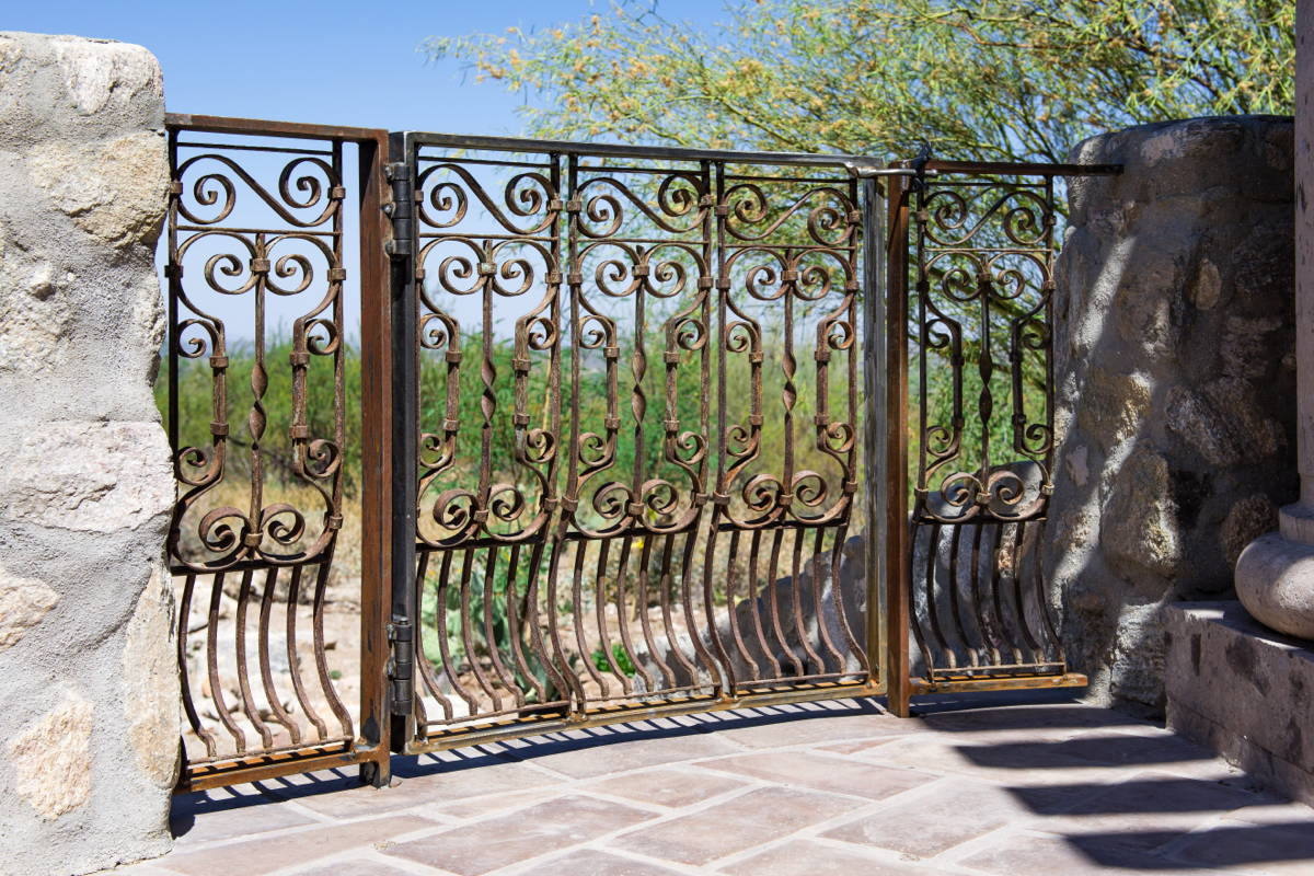 Boxhill original design featuring an ornate antique iron gate. 