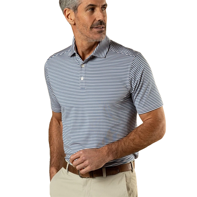 Man wearing a striped polo shirt and khaki pants, looking to the side.