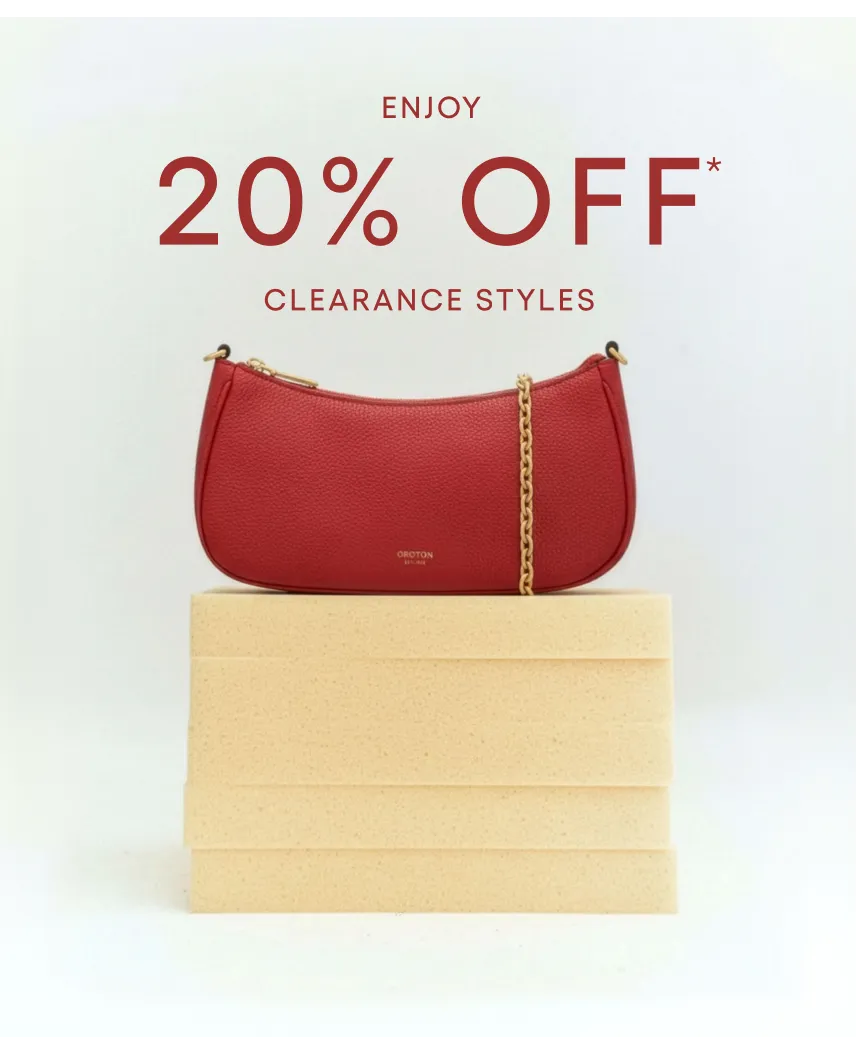 Red handbag on stacked boxes with 