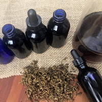 Herbal tinctures, bottles and herbs