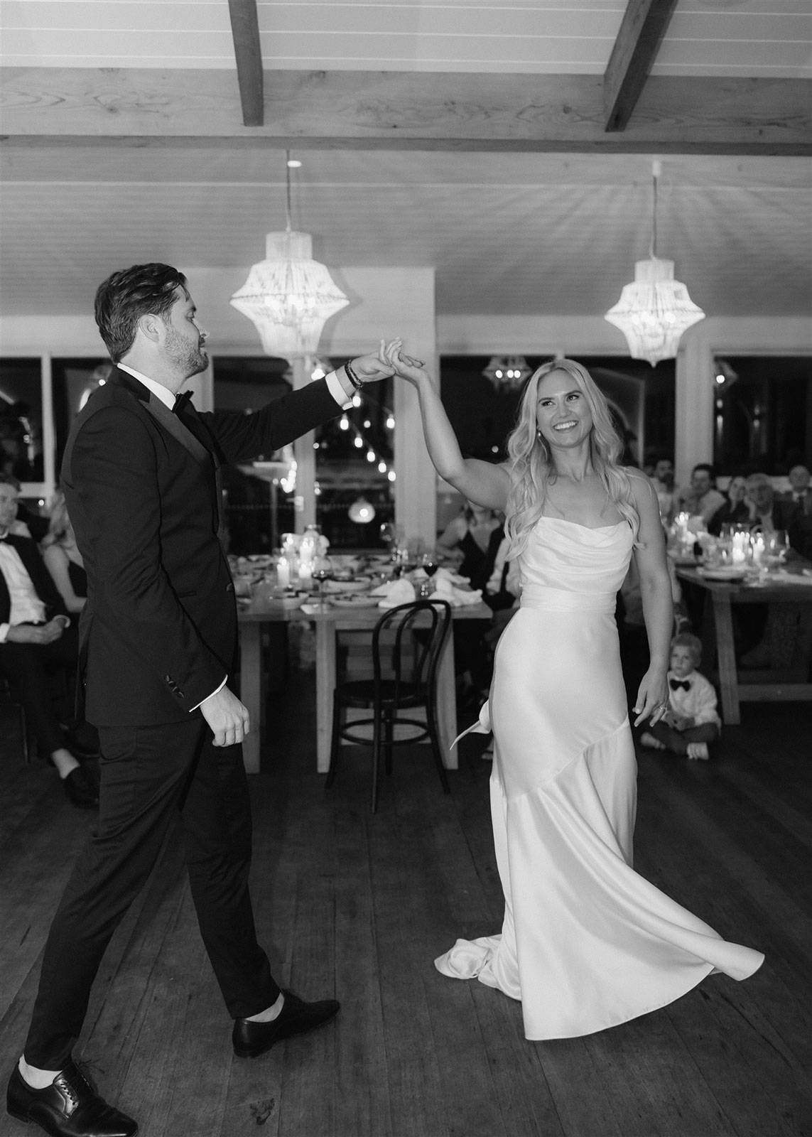 Bride and groom dancing at reception