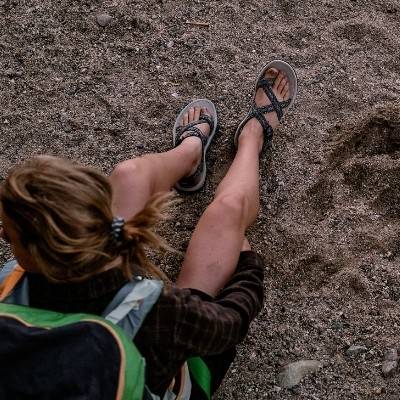 Woman hiking and wearing Cortona Outdoor Sandals by Viakix 