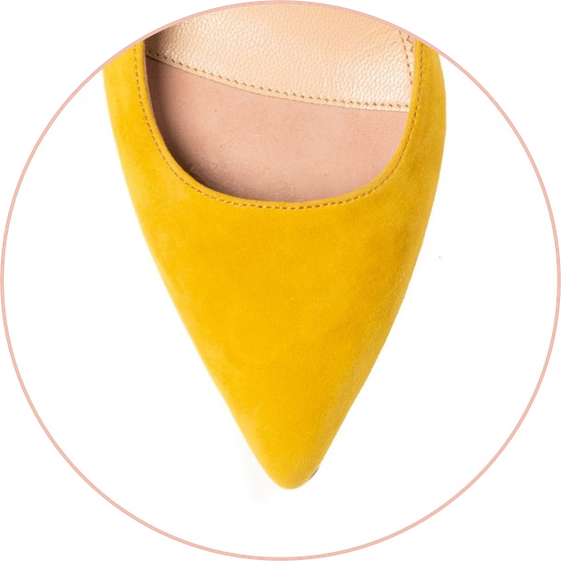 Yellow pointed toe shoe viewed from above.