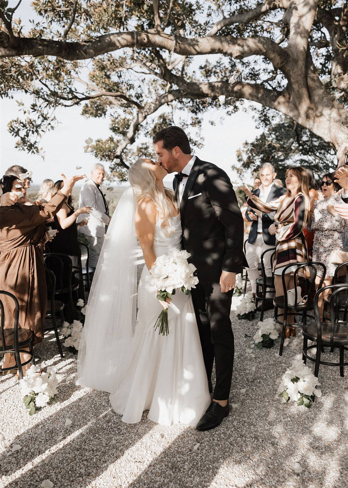 Bride and groom sharing a kiss