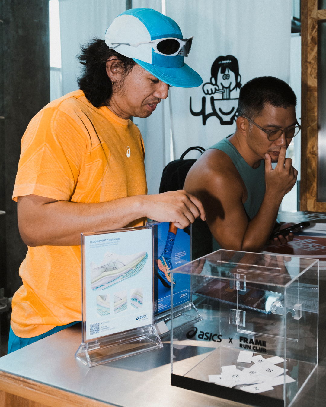 FRAME RUN CLUB participants checking in before the Global Running Day community run