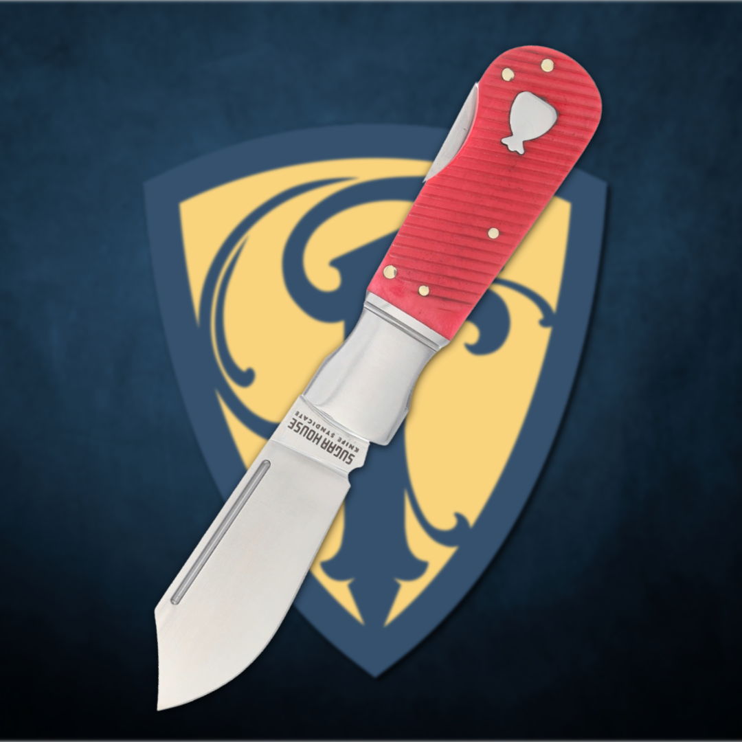 Folding knife with a red handle on a shield background.