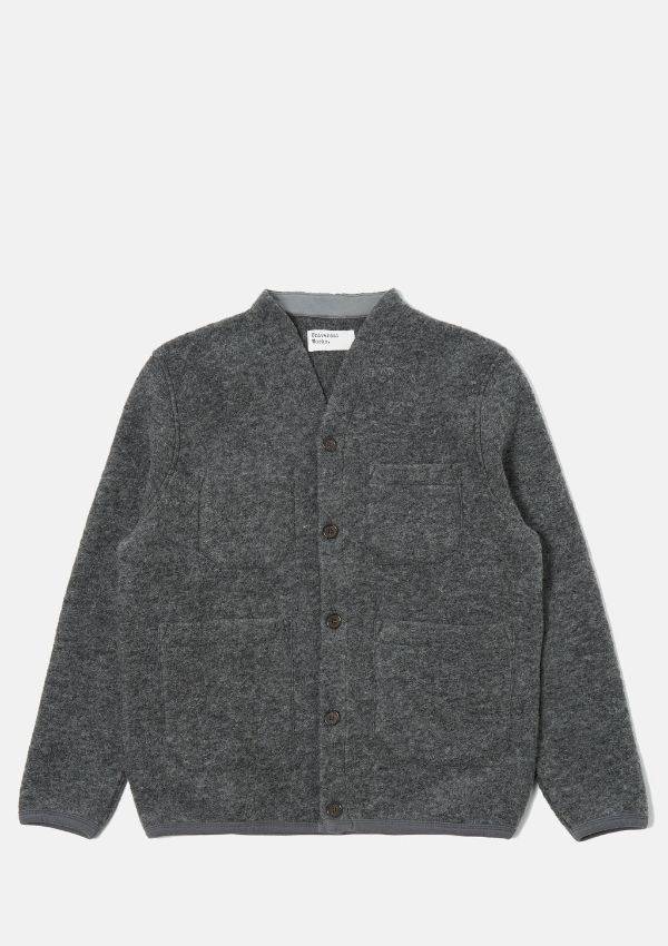 A picture of a Universal Works Cardigan in a dark grey.