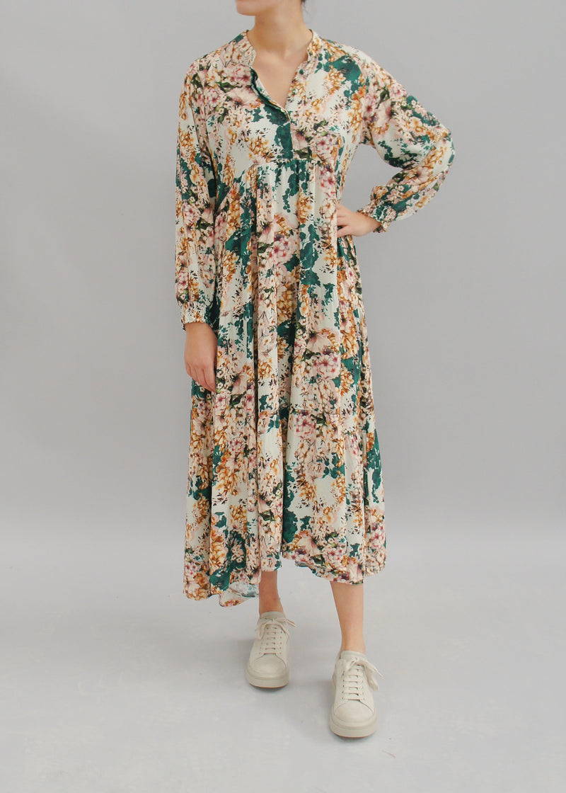 A model wearing a floral midi dress