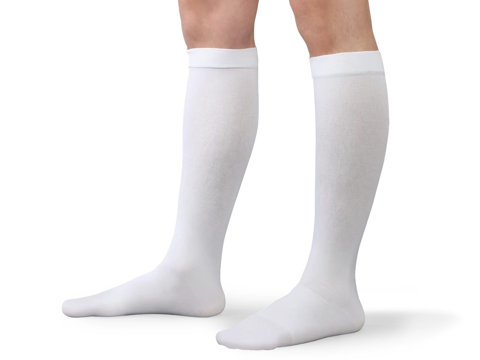 Person wearing knee high anti-embolism stockings
