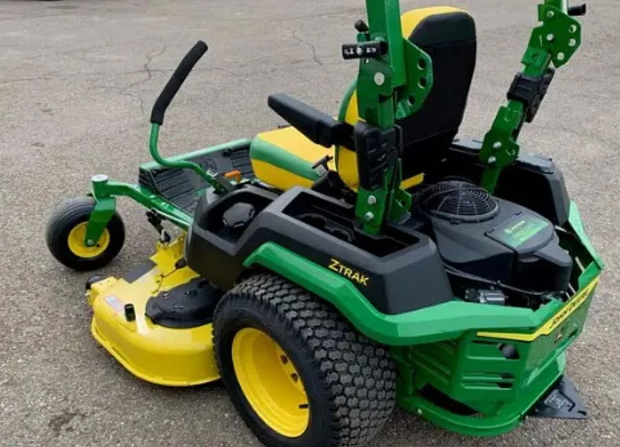 Rear three-quarter green yellow John Deere ZTrak zero-turn mower ROPS seat rear engine yellow deck John's Compact Electric horn featured customer install gallery photo 1