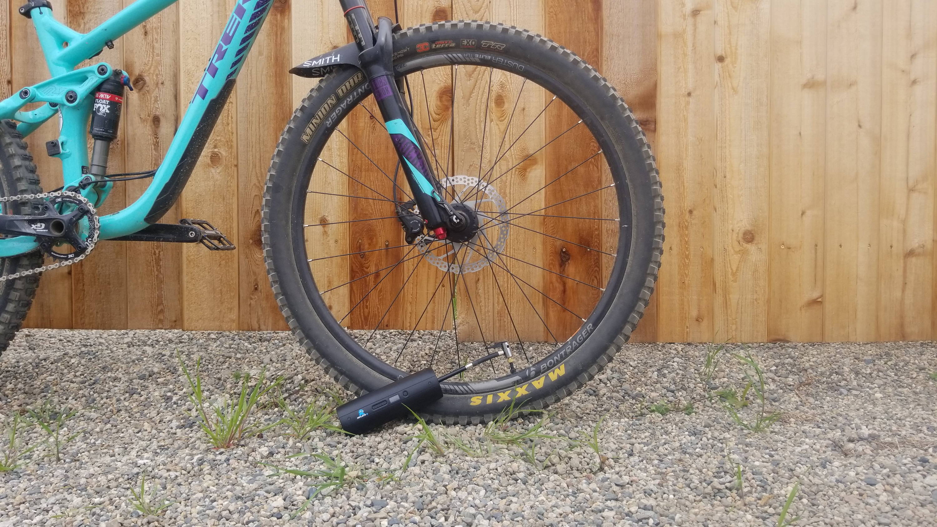 Inflate-R pumping up a bike tire.