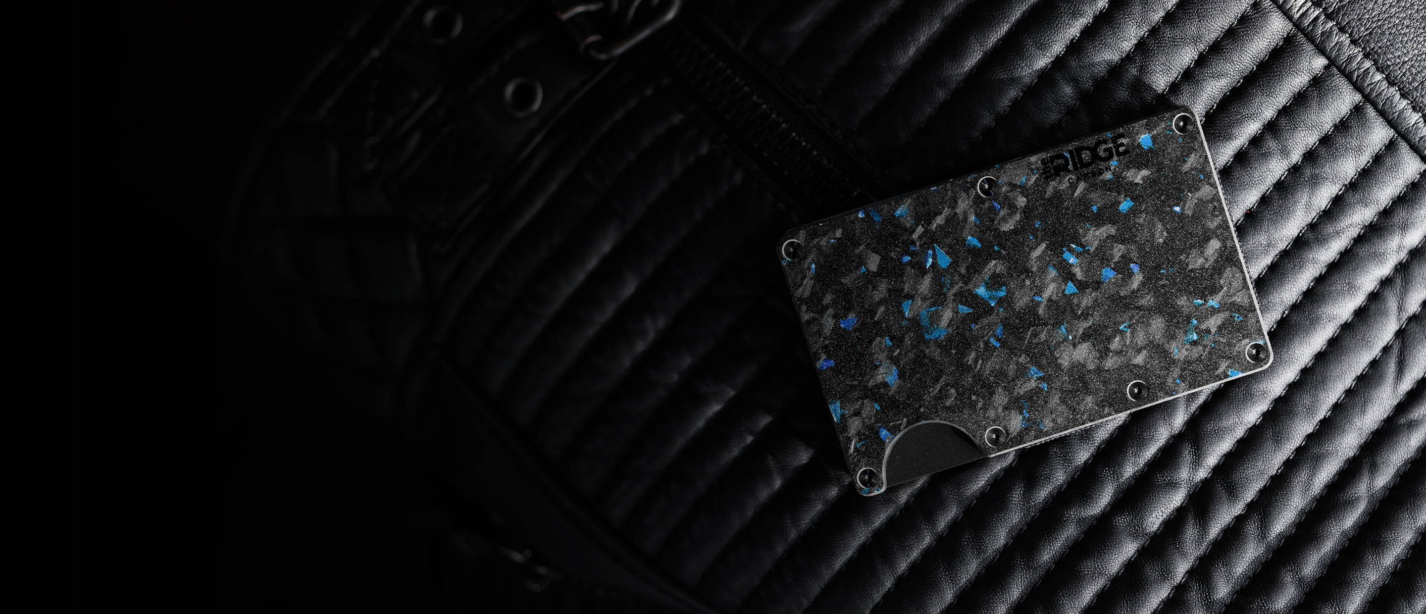Forged Pacific Ridge wallet on dark background