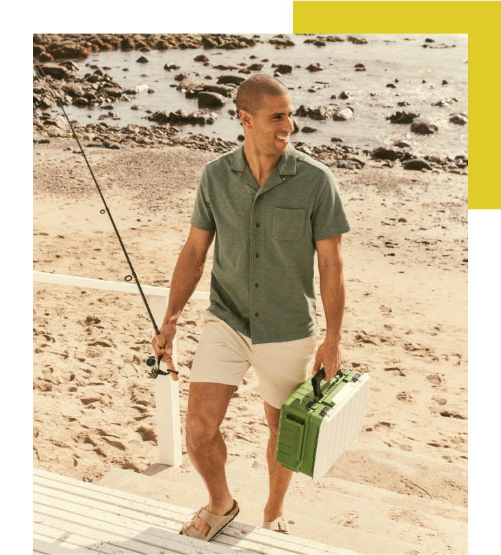Model is wearing UNTUCKit Duck Green Sapori shirt and Whitley shorts. 