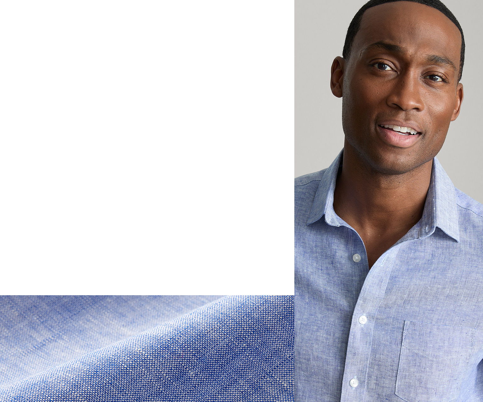 A man in a blue shirt smiling against a light background.