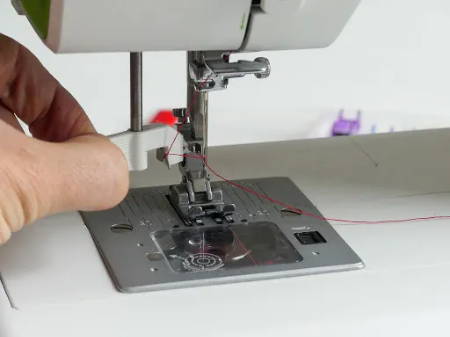 Semi-Automatic Needle Threader on Sewing Machine
