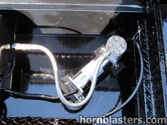 Alternate angle Shocker XL train horn assembly on 2005 Chevrolet Silverado 1500 photo 11