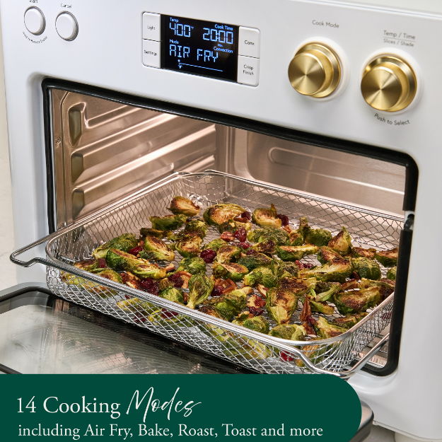 Oven with food, displaying cooking modes: Air Fry, Bake, Roast, Toast, and more.