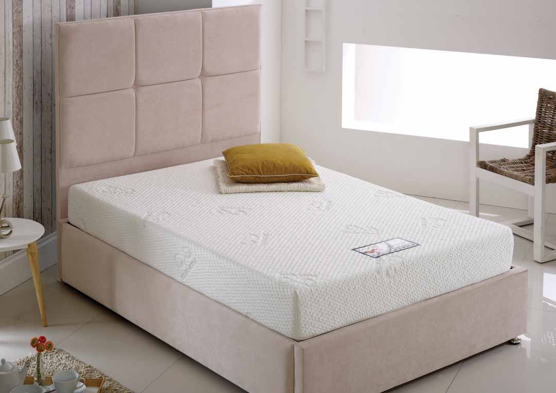 Kayflex mattress on cream divan bed
